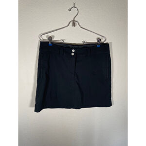 Women’s Nike athletic golf skirt with built-in shorts. Size 10. Pockets